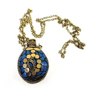 Aromacoulon oval bronze inlaid with turquoise (5.5x4.5x2 cm)