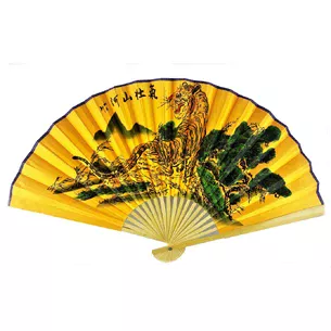 Bamboo fan with tiger silk on a golden background