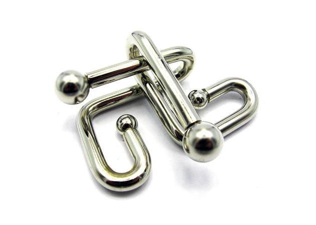 Фото 1 - Metal puzzle (12x8x4.5 cm) 19282