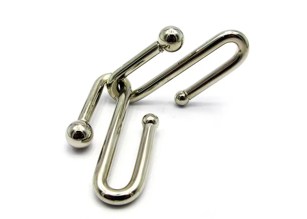 Фото 1 - Metal puzzle (12x8x4.5 cm) 19286