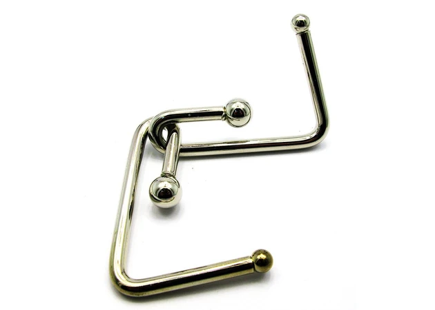 Фото 1 - Metal puzzle (12x8x4.5 cm) 19290