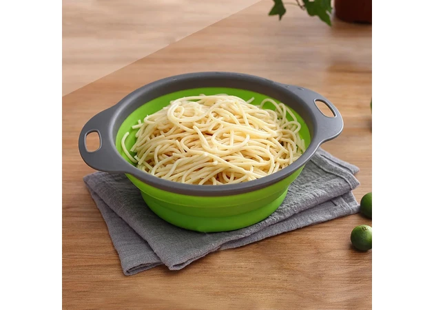 Фото 1 - Collapsible silicone colander with round green handles (240x195x130 mm).