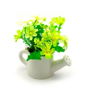 Flowers in a watering can (14x13.5x7.5 cm)