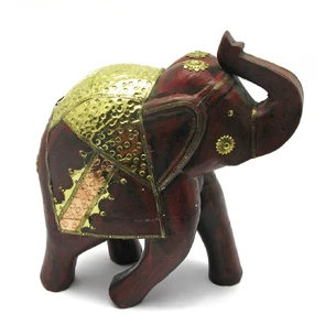 Antique wooden elephant with copper inserts (h-30 cm).