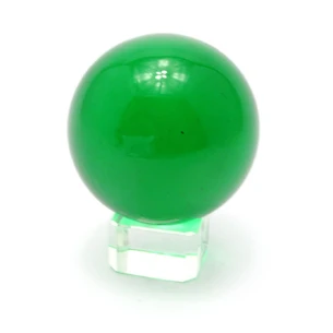 Crystal ball on a green stand (5 cm)