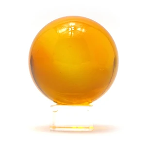 Crystal ball on an orange stand (6 cm)