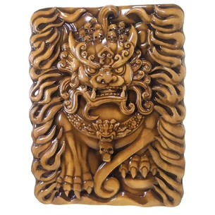 The Heavenly lion of the Buddha is carved, covered with patina and varnish (29x38x2.4 cm) solid wood.
