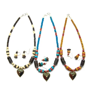 Bone necklace with pendant and earrings