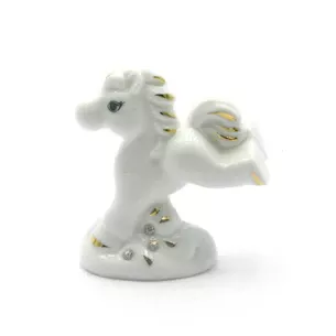 Porcelain horse (7x6.5x3.5 cm)