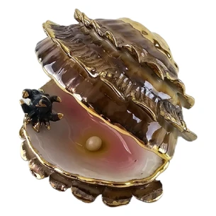 Brown porcelain pearl (8.5x6x6 cm)