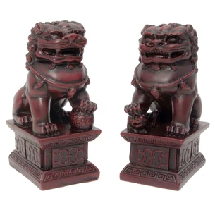 Chinese lions, a pair of brown stone chips (10.5x6.5x4.5 cm)