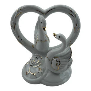 Swans with a porcelain heart (11x11x7 cm)