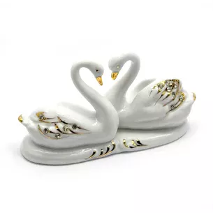 A pair of porcelain swans (13x7x4.5 cm)