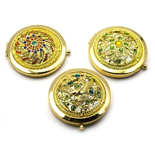 Cosmetic mirror Pattern with stones gold (d-7 cm) (in a box + case)