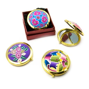 Cosmetic mirror with a gold pattern (d-7 cm) (in a box + case)