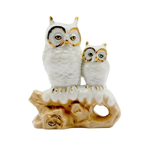 A pair of porcelain owls (9.5x11.5x4 cm)