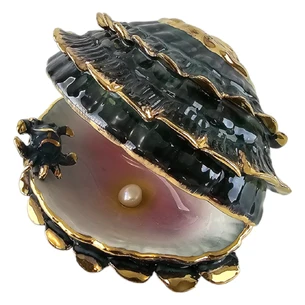 Black porcelain pearl (8.5x6x6 cm)